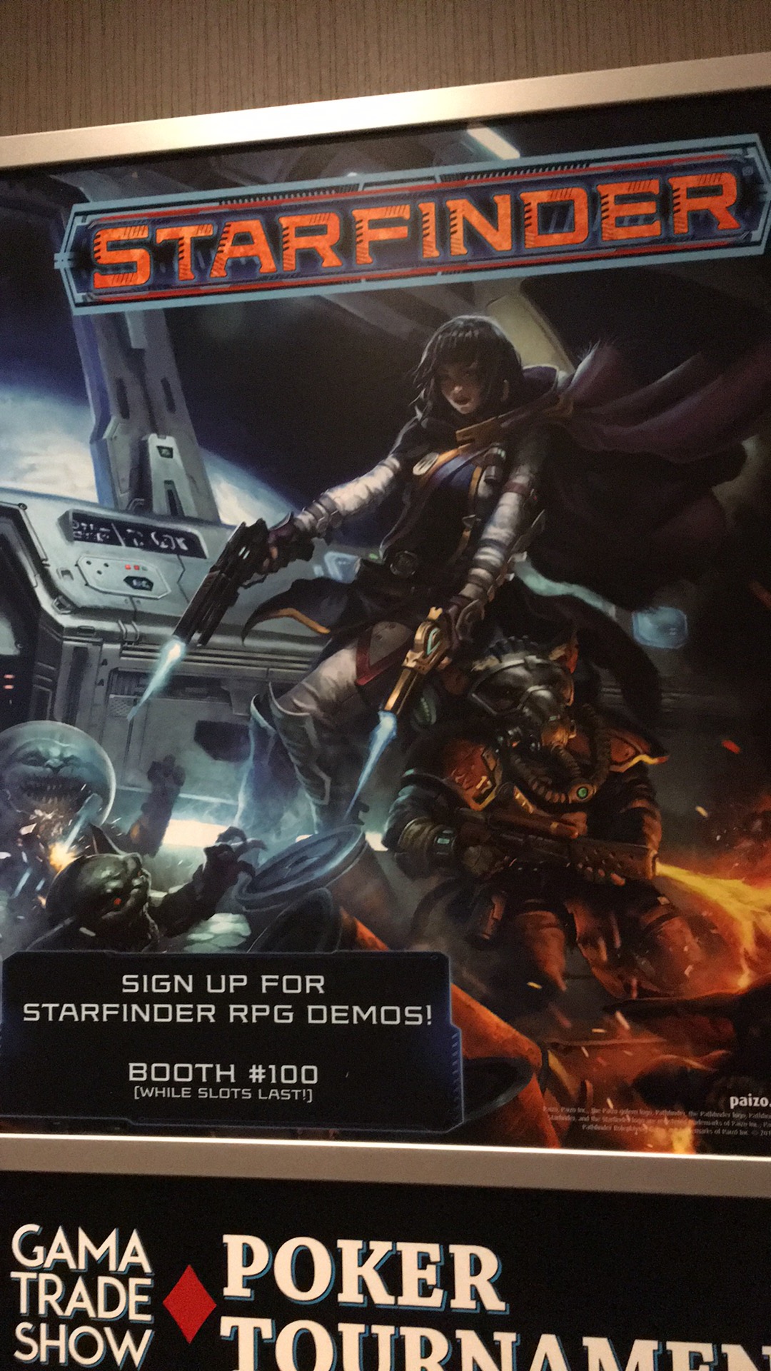 A Starfinder poster on display at GAMA